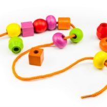 Wooden Beads on a String making a Colorful Toy Necklace